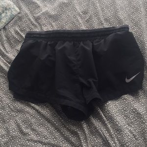 Nike black athletic shorts with zipper